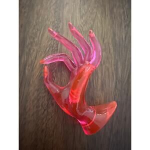 Pink clear acrylic ring holder hand